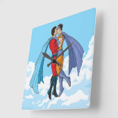 Horloge Carrée Les deux superhéros de SlipperyJoe embrassant un v (Angle)