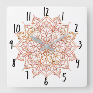 Horloge Carrée Mandala rose et orange sur Glam blanc