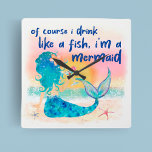 Horloge Carrée Mer de Mermaid | Boire Comme Un Poisson Plage Trop<br><div class="desc">Ajoutez un peu d'humour tropical à votre maison avec cette boisson marine de sirène ludique et fantasque comme une horloge murale de poisson. Cette horloge, qui s'ajoute à tout tiki bar ou salle sur le thème de la plage, apportera une touche d'amusement côtier à votre décor. Avec une sirène sur...</div>