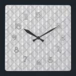 Horloge Carrée Mère blanche de perle avec argent<br><div class="desc">Mère blanche de Pearl avec des dessins en argent par Umua. Imprimé et expédié par Zazzle ou ses partenaires.</div>