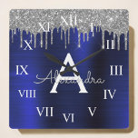 Horloge Carrée Mongram de Silver Navy<br><div class="desc">Silver and Navy Blue Faux Foil Metallic Sparkle Glitter Brushed Metal Monogram Name and Initial Luxury Wall Clock. This makes the perfect sweet 16 birthday,  wedding,  bridal shower,  anniversary,  baby shower or bachelorette party gift for someone that loves glam luxury and chic styles.</div>