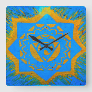 Horloge Carrée or sur le symbole tantric bleu