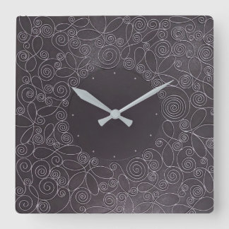 Horloge Carrée ornements en fil sur fond noir