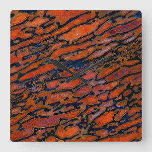 Horloge Carrée Os de dinosaure de Petria rouge