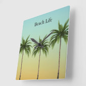 Horloge Carrée Palmiers en rang, vie sur la plage (Angle)