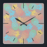 Horloge Carrée palpables summer tropcal colorful pineappes<br><div class="desc">Joli motif d'ananas.</div>
