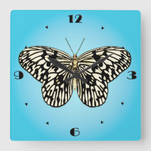 Horloge Carrée Papillon noir et blanc sur la turquoise