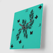 Horloge Carrée Papillon noir sur vert (Angle)