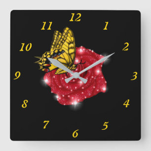 Horloge Carrée Papillon sur rose rouge avec étoiles et gouttes de