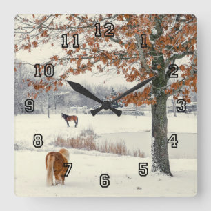 Horloge Carrée Poney and horse in snow by a lake clock