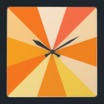 Horloge Carrée Pop Art Modern 60s Funky Geometry Rays in Orange<br><div class="desc">Cette horloge carré pop art branchée et rétro des années 60 a des rayons orange psychédéliques / sunbursts tournant dans un motif géométrique. Il y a douze rayons pour marquer l'heure - pas besoin de chiffres sur cette horloge funky,  minimaliste,  ultra-mod. C'est super,  bébé.</div>