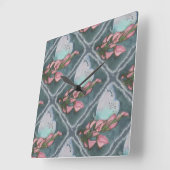 HORLOGE CARRÉE ROSE ET BLEU BOUTTERFÉ (Angle)