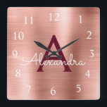 Horloge Carrée Rose Rose Gold Burgundy Métallc Monogram<br><div class="desc">Blush Pink - Rose Gold and Burgundy Faux Stainless Steel Foil Monogram Name and Initial Serving Wall Clock. The Wall Clock makes the perfect gift for someone who loves pink métallc decor.</div>