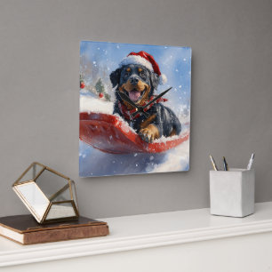 Horloge Carrée Rottweiler en traîneau 'Qu'il neige' Noël