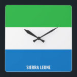 Horloge Carrée Sierra Leone Drapeau éblouissant patriotique<br><div class="desc">Le drapeau de la Sierra Leone Éblouit le Mur Carré patriotique cadenas dans les couleurs et les éléments du drapeau national de la Sierra Leone couvrant le devant de l'horloge. Les couleurs du drapeau national sont complétées par le texte "Sierra Leone" en bas. Le texte est entièrement personnalisable à l'aide...</div>