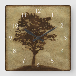 Horloge Carrée Silhouette d'arbre sur l'arrière - plan en bronze