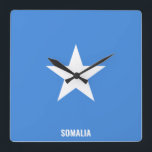 Horloge Carrée Somalia Flag Dazzling Patriotic<br><div class="desc">Somalia Flag Dazzling Patriotic Square Wall Clock in the colors and the element of the Somalia national flag covering the front of the clock. National flag colors are complemented with the text "Somalia" on the bottom. Texte is fully customizable using "Customize it!" feature. Feel free to change it, remove it...</div>