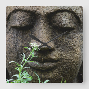 Horloge Carrée Stone garden statue with flower