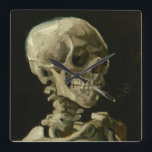 Horloge Carrée Tête de squelette avec cigarette de Van Gogh<br><div class="desc">Tête d'un squelette à la cigare brûlante par Vincent Van Gogh, huile sur toile 1886, est une étude à l'huile peinte d'un crâne humain et du squelette supérieur, dans la bouche duquel l'artiste a inséré une cigarette brûlante, produisant un effet à la fois macabre et humoristique. Probablement peint tandis que...</div>