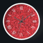 Horloge Chiffres blancs motifs de roses rouges<br><div class="desc">Juste à temps pour la Saint-Valentin, une perle de roses rouges dans un motif sans couture avec des chiffres romains blancs</div>