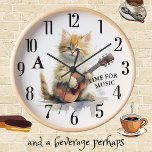 Horloge Cute Chat Jouer Guitare Monogramme Personnalisé<br><div class="desc">Cute Cat Custom Monogramme jouant de la guitare pour cette merveilleuse horloge murale — vous l'aimerez pour vous-même ou grand comme un cadeau pour l'amoureux des chats dans votre vie. Pour toute question de conception ou demande spéciale, envoyez un conversation ou un courriel à charmdesignstudio@rcn.com et nous serons heureux de...</div>