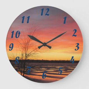 Horloge de coucher du soleil de lac ice