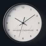 Horloge Élégant Moderne Personnalisé Avec Le Nom Monogramm<br><div class="desc">Élevez votre décor maison avec notre crème élégante moderne personnalisée avec le nom Monogram Horloge. Cette horloge murale finement conçue mêle harmonieusement esthétique contemporaine et touche personnalisée, ce qui en fait un complément élégant et fonctionnel à toute pièce. Avec son nom et son monogramme, cette horloge ajoute une touche de...</div>