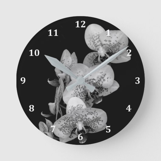 Horloge en noir et blanc avec orchidées (Recto)