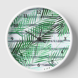 Horloge Feuilles de palme sur fond rayé noir et blanc