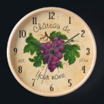 Horloge French Chateau avec Grapes Vintage Personalized<br><div class="desc">Créez votre propre horloge murale d'inspiration viticole de château vintage sur mesure avec ce modèle facile. Cette élégante horloge ronde présente une grappe antique de raisins violets, recolorés et éclairés, ils contrastent agréablement avec les vieux, légèrement tachés arrière - plan parchemin. Le texte en courbe dit "Château de [Votre Nom],...</div>