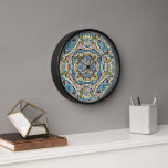 Horloge Jaune Vert Turquoise Bleu Orange Hip Bohème Art<br><div class="desc">Belle motif en mosaïque Batik contemporaine orange, jaune, bleu turquoise et ocre marron. Motif décoratif disponible sur une variété de produits élégants et assortis accents et accessoires de décoration maison. Un design original pour le décorateur d'intérieur ou ceux qui aiment décorer leur chambre de maître ou d'enfant, la crèche, le...</div>