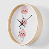 Horloge Jolis triplés apeach (Angle)