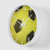 Horloge Le football du dos et du jaune. (Angle)