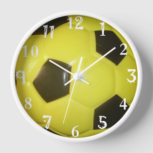 Horloge Le football du dos et du jaune. (Recto)