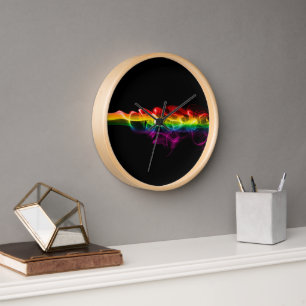 Horloge Le panache d'énergie arc-en-ciel de SlipperyJoe a 
