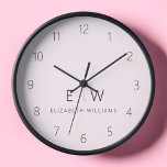 Horloge Monogramme minimaliste rose vif<br><div class="desc">Améliorez votre décoration de maison avec notre horloge murale Monogramme minimaliste classique élégant et moderne. Ce magnifique garde-temps allie élégance intemporelle et minimalisme contemporain, élevant votre espace de vie à de nouveaux niveaux de sophistication. Réalisée avec précision et attention minutieuse aux détails, cette horloge murale est plus qu'un simple accessoire...</div>