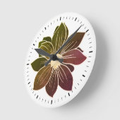 Horloge murale à contour blanc et fleurs aux tons (Angle)