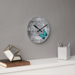 Horloge murale acrylique turquoise papillon