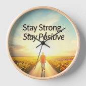 Horloge murale avec un design positif "Restez fort (Recto)