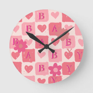 Horloge murale bébé à carreaux roses