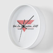 horloge murale blanche sans chiffres avec logo de  (Angle)