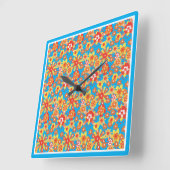 Horloge murale carré, Fleurs orange, Bordure bleue (Angle)