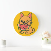 Horloge murale chat orange mignon mangeant pastèqu (Maison)
