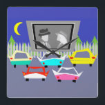 Horloge murale de la petite ville<br><div class="desc">Passe le popcorn ! Cette horloge murale de film Drive-In de la petite ville vous transportera à une époque plus simple, où le gaz était bon marché, le rock and roll était jeune, et les stars de cinéma de l'âge d'or d'Hollywood brillaient plus brillamment que le ciel nocturne. Le design...</div>