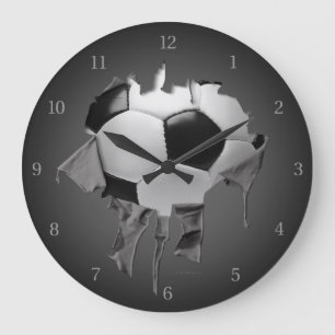 Horloge murale déchirée d'obscurité du football