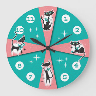Horloge murale des chats noirs modernes du milieu