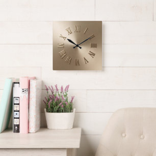 Horloge murale élégante en faux métal doré