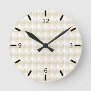 Horloge murale élégante moderne aux œufs dorés abs
