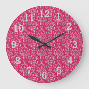 Horloge murale en damas rose et argenté avec des