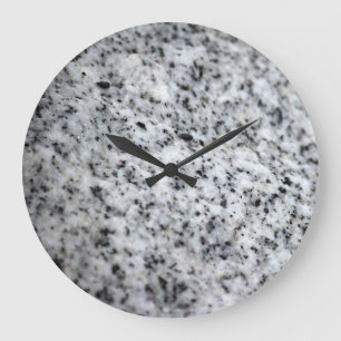 Horloge murale en granit blanc et noir